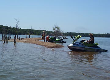 jetskis on sandbar