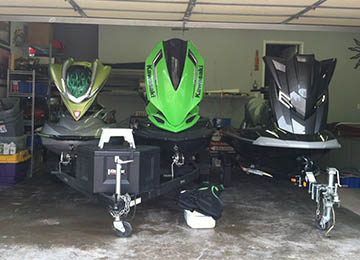 head on view of three modified jetskis