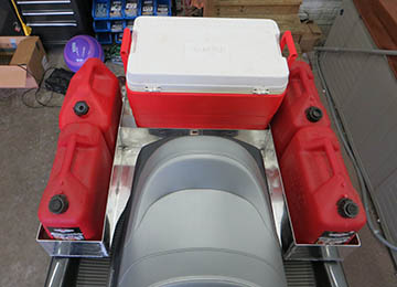 above view of jetski loaded with extra gas cans and coolers