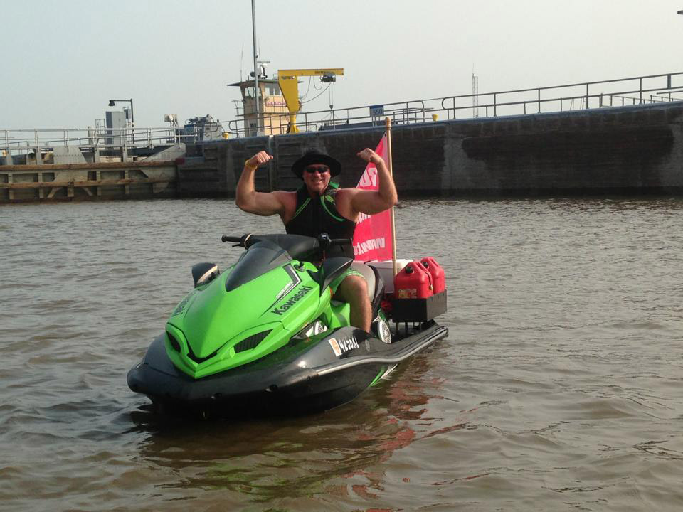 rear quarter view of jetski loaded with extra gas cans and coolers