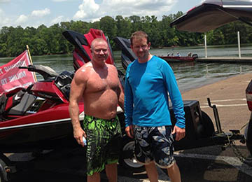 front quarter view of jetski loaded with extra gas cans and coolers